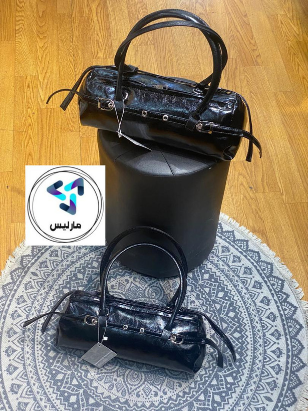 کیف زنانه مارلیس مستطیلی تک زیپ رنگ مشکی با ابعاد 35*14 سانتی متر