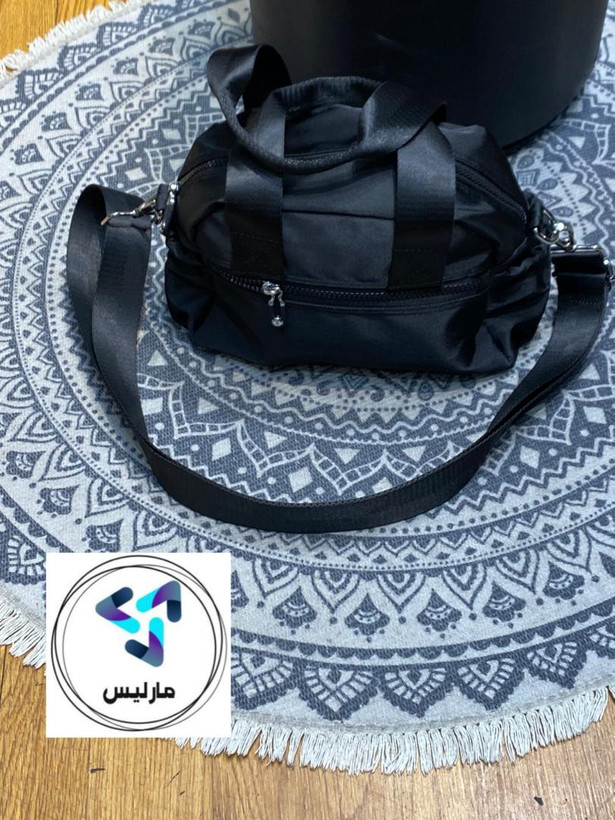 کیف زنانه مارلیس برزنتی با بند پهن دوشی در ابعاد 27*19 سانتی متر